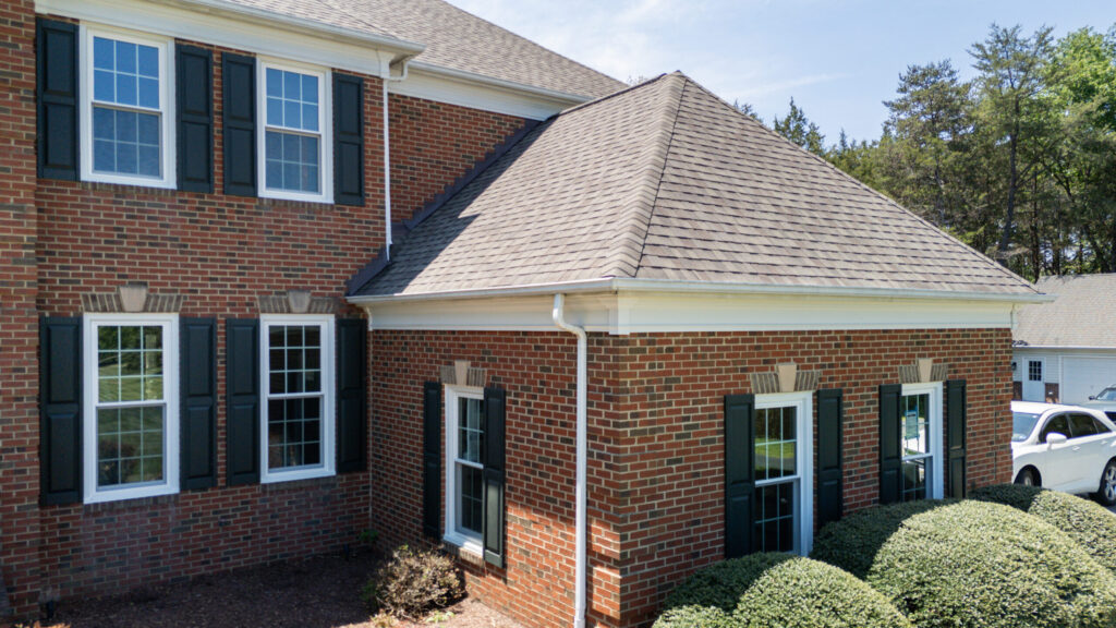 well-designed roof with shingles and exterior home details