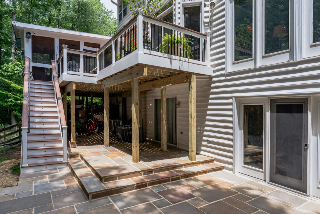 Modern custom deck with stylish railings and comfortable outdoor seating