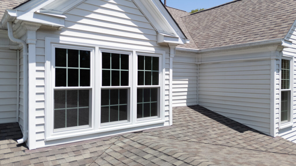 Gutter guards installed to help keep leaves and debris out of residential gutters